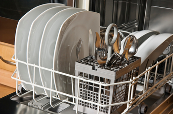 Dishwasher with clean white dishes