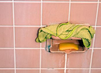 One of the different ways to use dryer sheets is using them to remove soap scum in a shower.